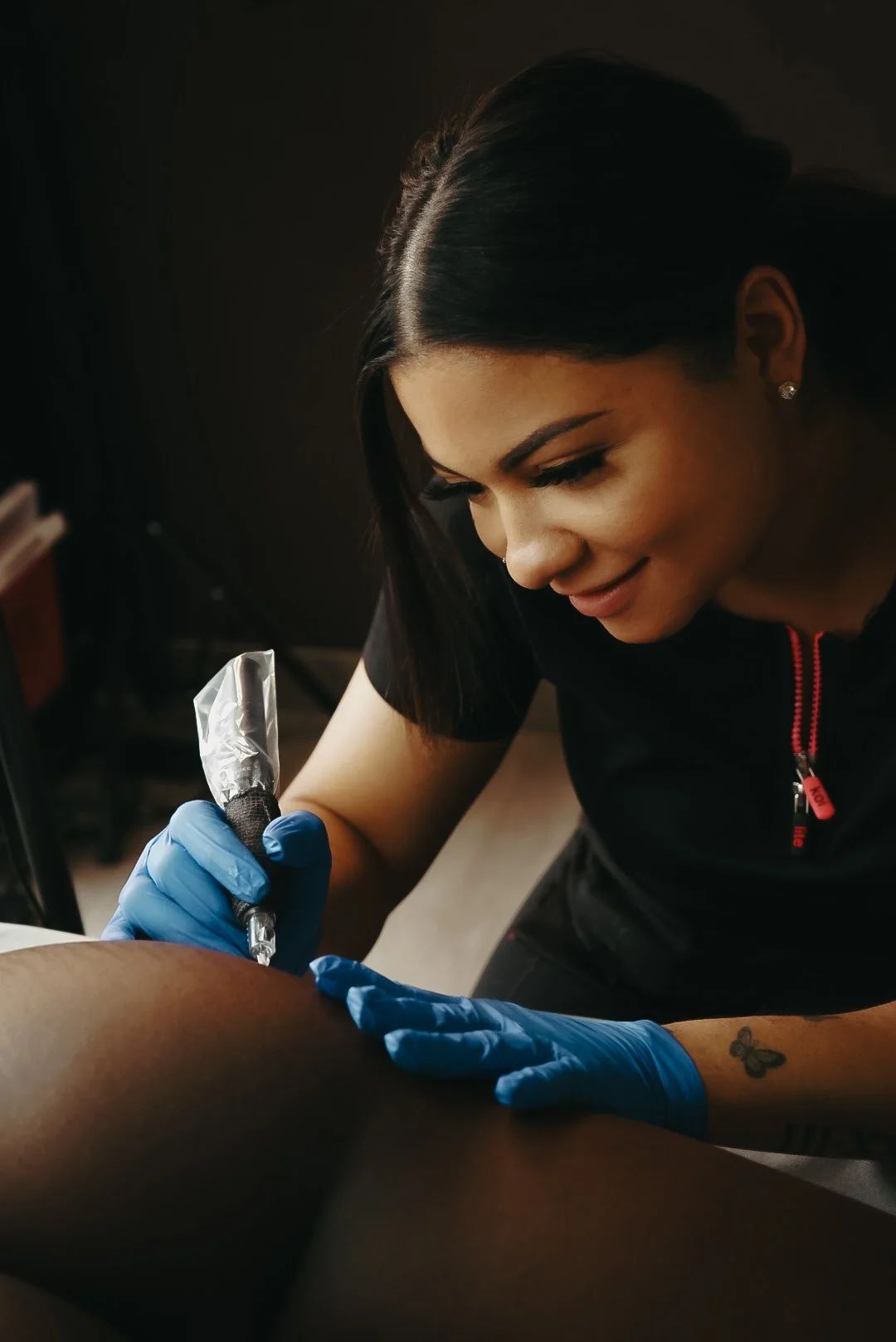 A Wholesome Empire practitioner treating a client