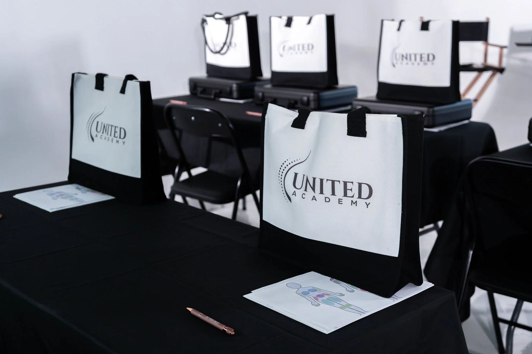 Training stations set up with United Academy student bags at Wholesome Empire